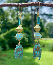 Load image into Gallery viewer, Etched Patina Face Charm and Leaf Dangling Earrings